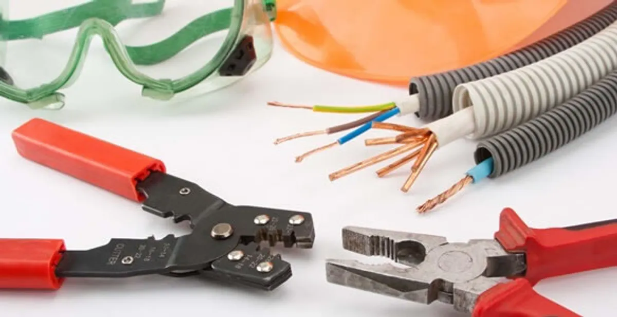 Electrical wiring repair with professional tools and safety equipment in Vandalia, OH