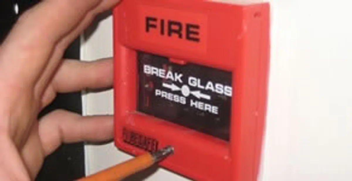 fire alarm installation service showing manual fire alarm pull station installed by licensed electricians in Dayton, OH