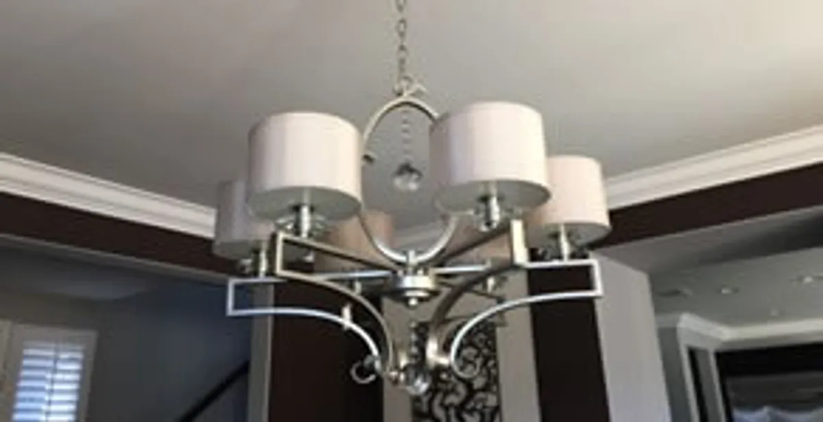 Modern chandelier installation with multiple light fixtures in Dayton, OH