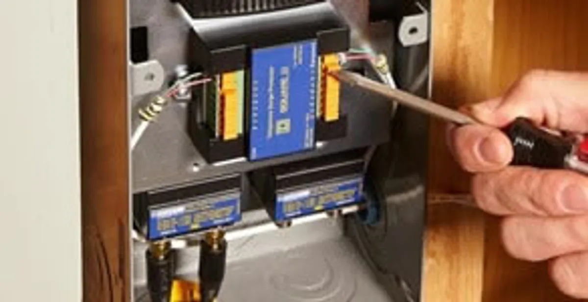 Whole home surge protection device being installed by a licensed electrician to protect electrical systems in Dayton, OH